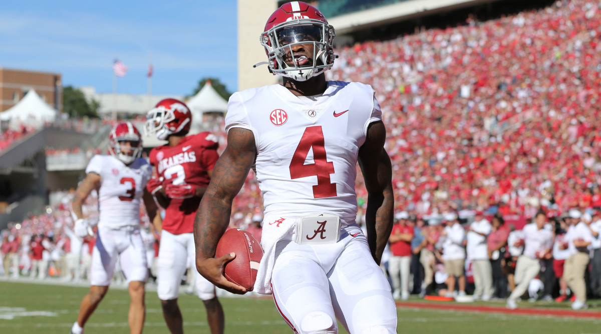 Alabama’s Jalen Milroe celebrates a touchdown vs. Arkansas.